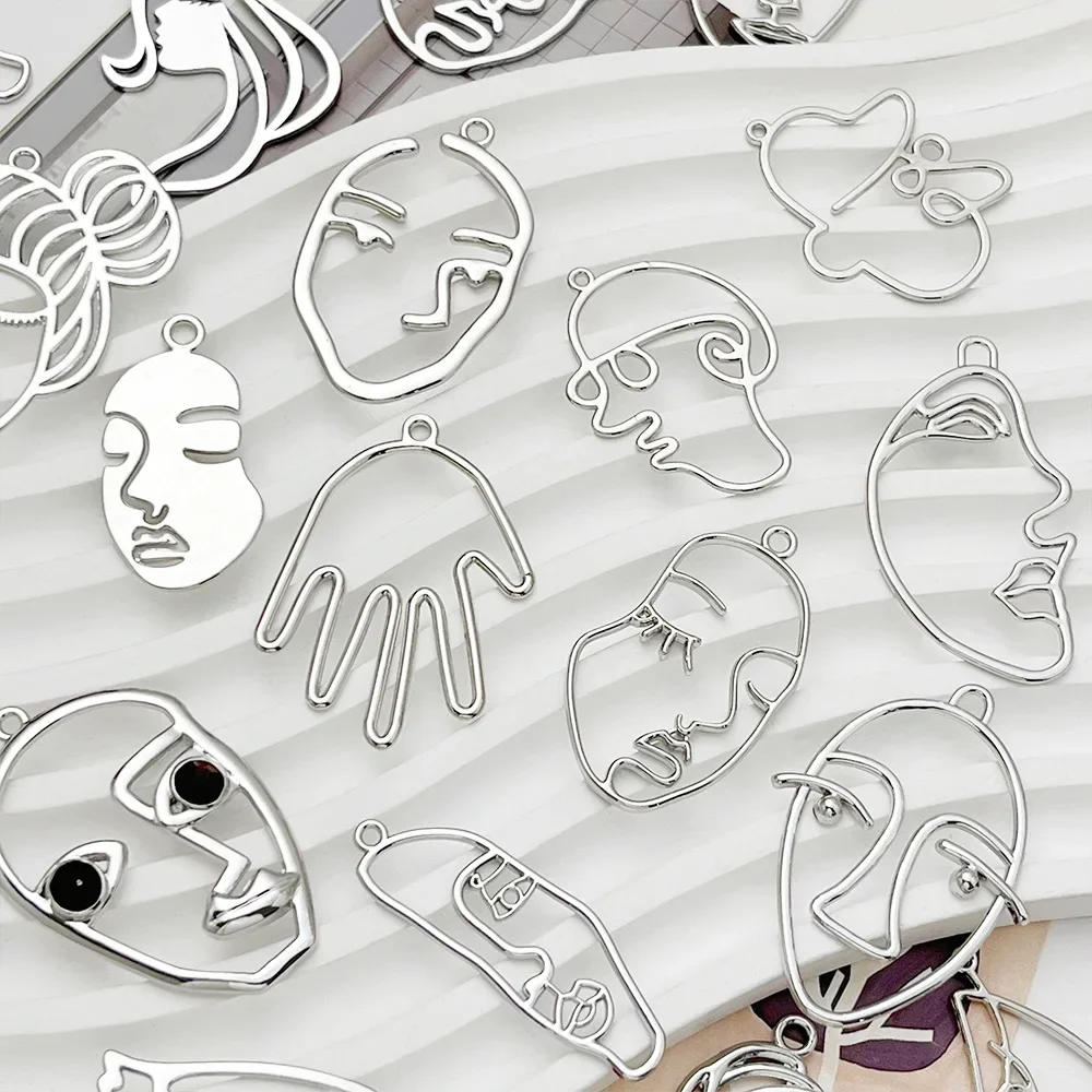 10 Stück handgemachte abstrakte Gesicht Anhänger Charms Silber Farbe hohle Halskette Ohrringe Anhänger Anschlüsse Diy Schmuck machen Erkenntnisse