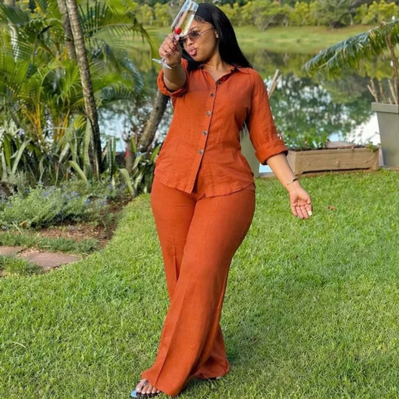 Elegantes, schickes, lässiges afrikanisches Mode-Zweiteiler-Set für Damen, einfarbiges, einreihiges Hemd und Hose.