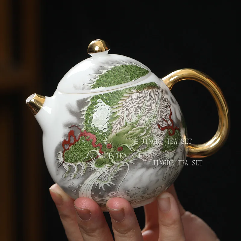 

Ceramic white jade porcelain gilded teapot semi manual Chinese Loong Kung Fu tea set