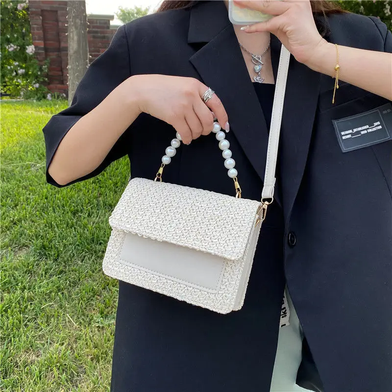 2023 New Summer Fashion Pearl Minimalist Western Style Crossbody Minimalist Ins Straw Woven Handbag