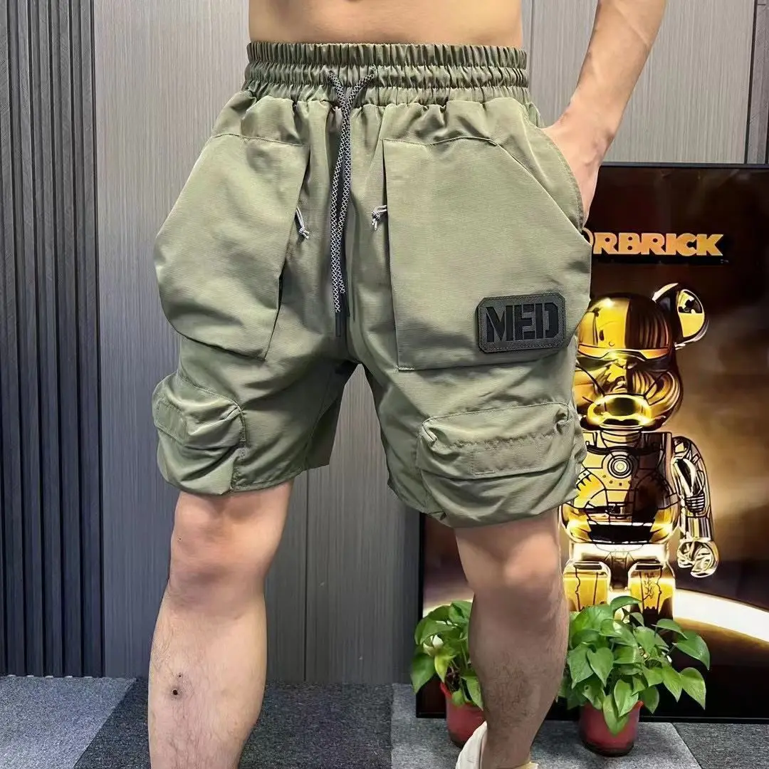 Männliche kurze Hosen mit Taschen arbeiten Herren Cargo Shorts ziehen Schnur grün Vintage Baumwolle lässig Harajuku lose 2024 Mode