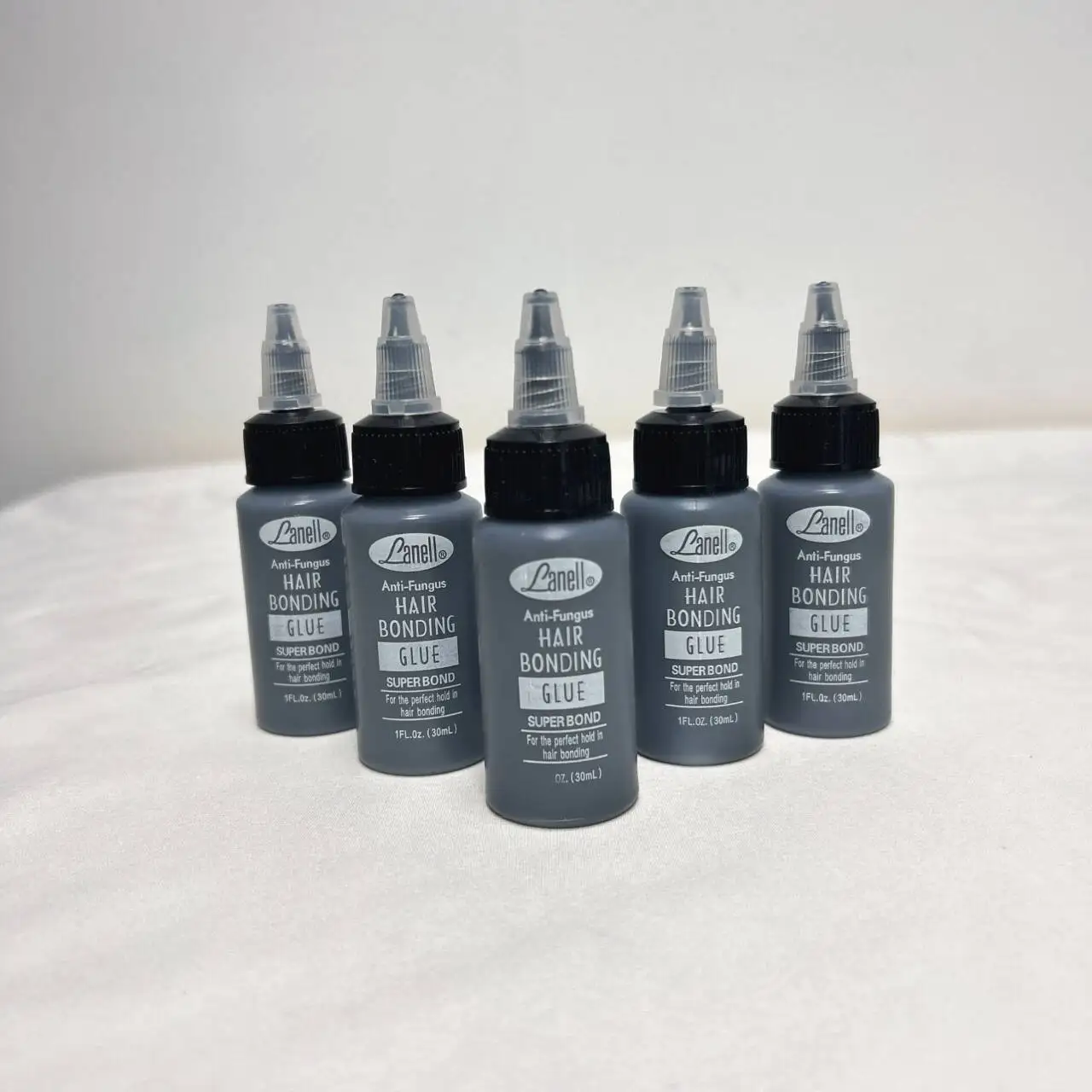 

Hair Bonding glue 30ml Waterproof Toupee Liquid Adhesive False Eyelashes Wig Glue Professional Hair Extension Invisible Bond