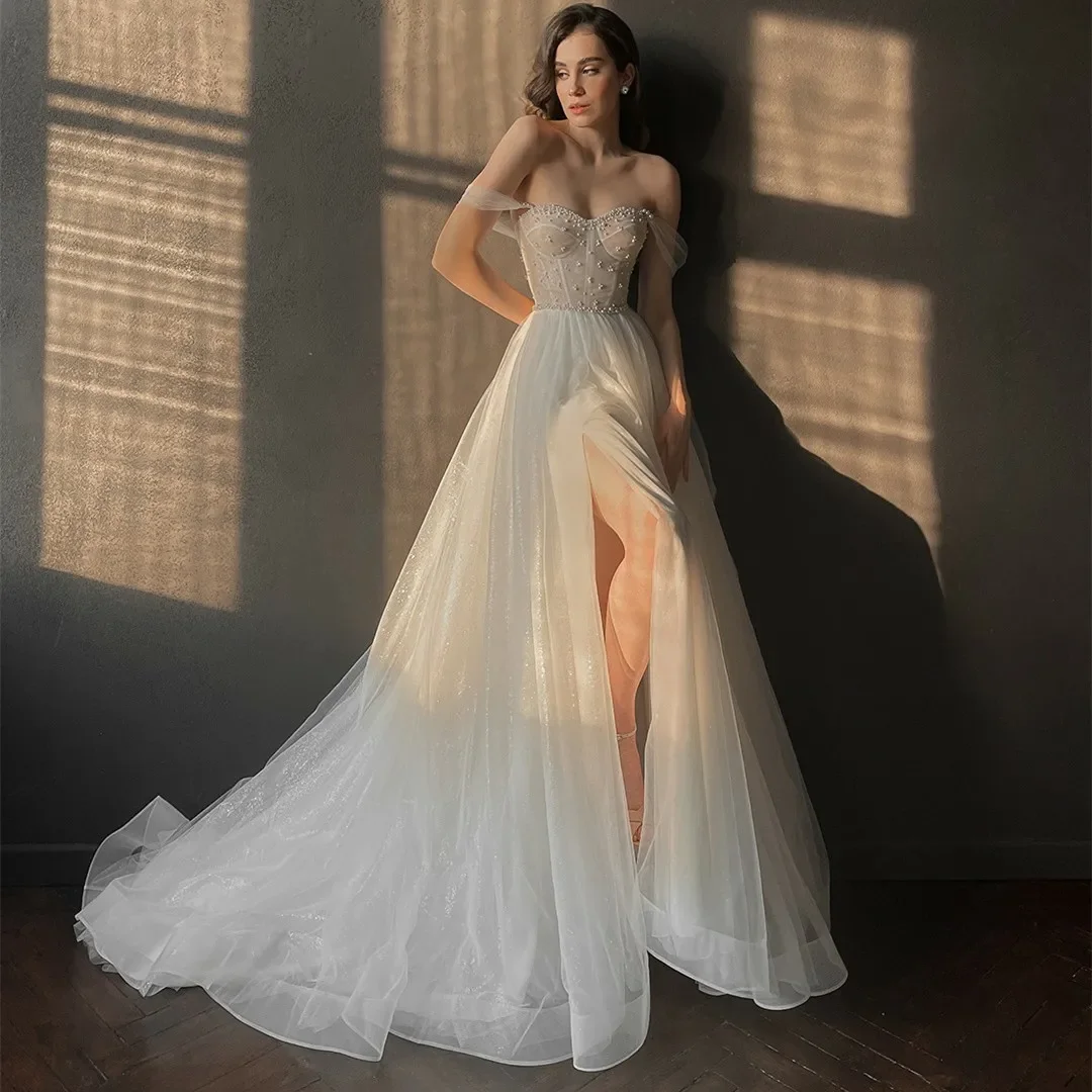 

Luxurious and elegant long off shoulder sexy wedding dress with slit a Line Sweep Train Garden Bridal dress Pearl after dress