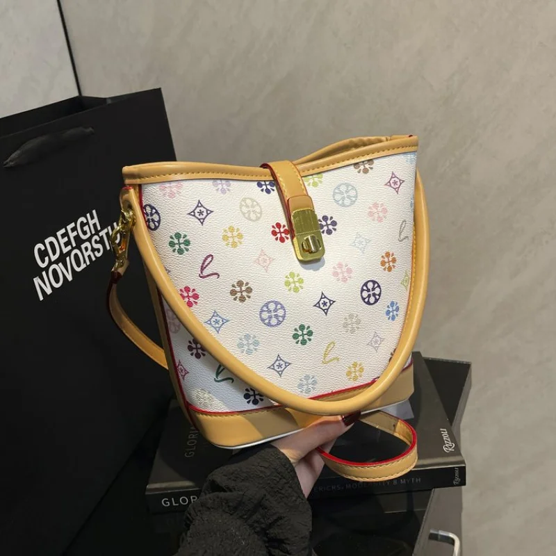 

Elegant Women's Handbag With Detachable Crossbody Strap Made From Genuine Leather By Renowned Designer