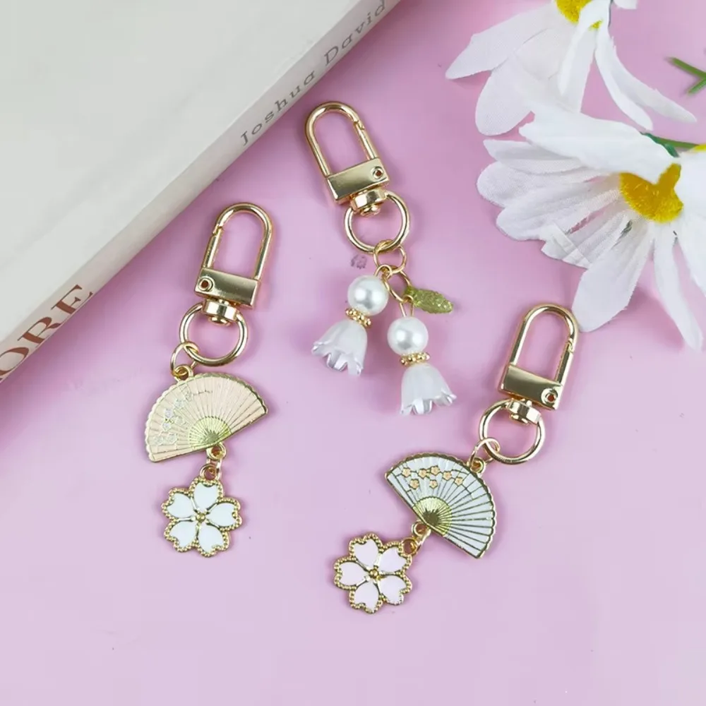 Sweet Fan Sakura Pendant Keychain Fashion Pearl Lily Of The Valley Key Ring for Women Wallet Earphone Case Ornament Jewelry