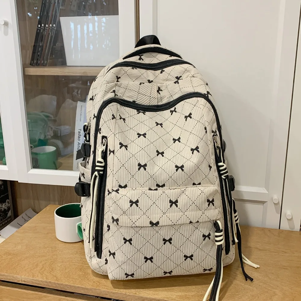

The Niche Rhombus Bow Backpack Cute Girl Printed Plush Going Out Campus Student School Bag Multifunctional Is Versatile Stylish