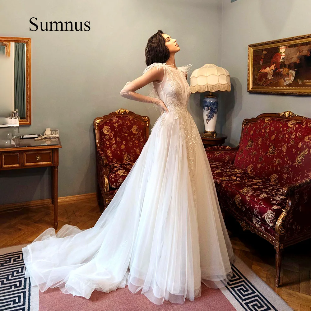 Sumnus luxo a linha branco vestidos de casamento penas lantejoulas contas sem costas princesa vestido de noiva shinny tule longo vestidos de casamento