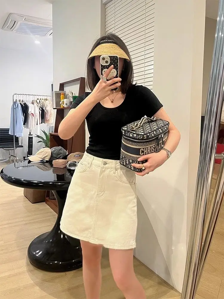 تنورة قصيرة عالية الخصر على شكل حرف A للنساء، طراز صيفي جديد، نسخة كورية، بفتحة جانبية، من الدنيم، بتأثير تنحيف، باللون البيج