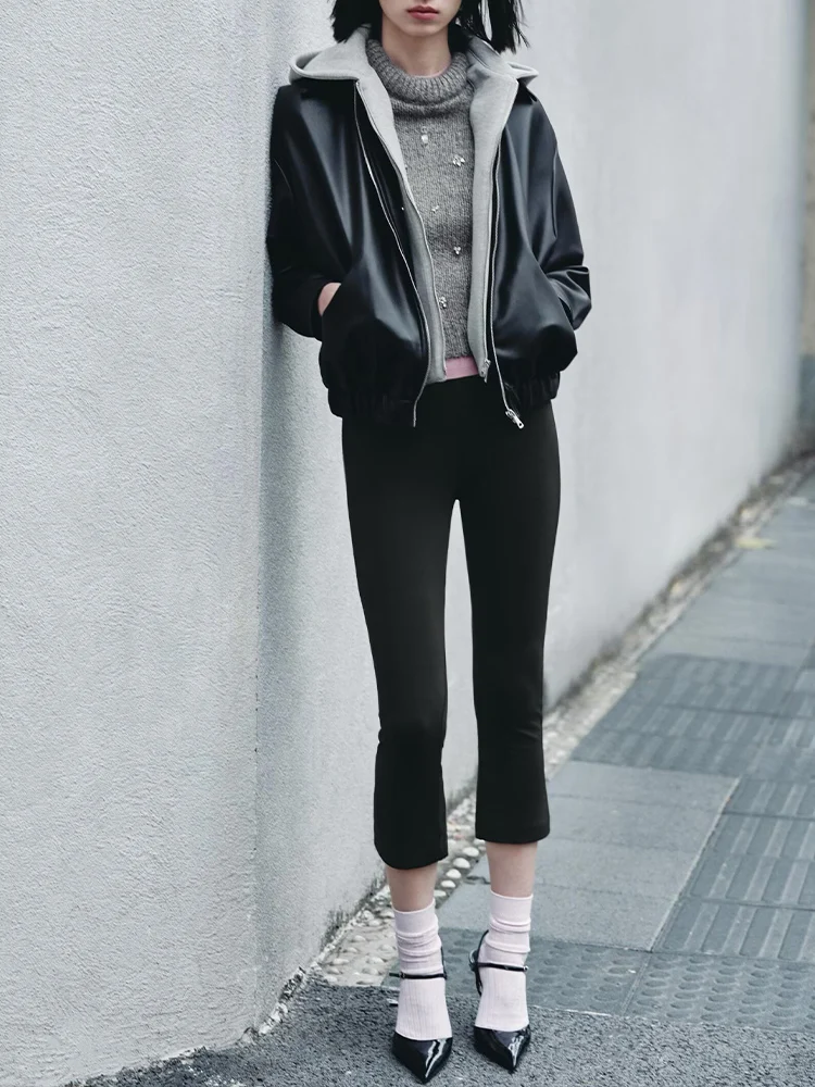 

European-style new women's fashion, versatile, elegant, slimming, faux two-piece spliced ​​leather jacket with hood.