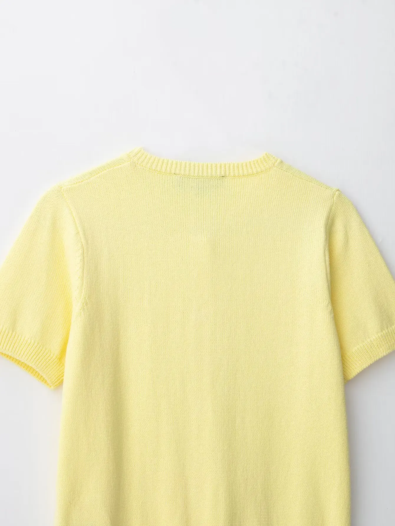 Giacca lavorata a maglia con fiocco di perle artificiali semplice e comoda moda casual da donna nuova estate 2025