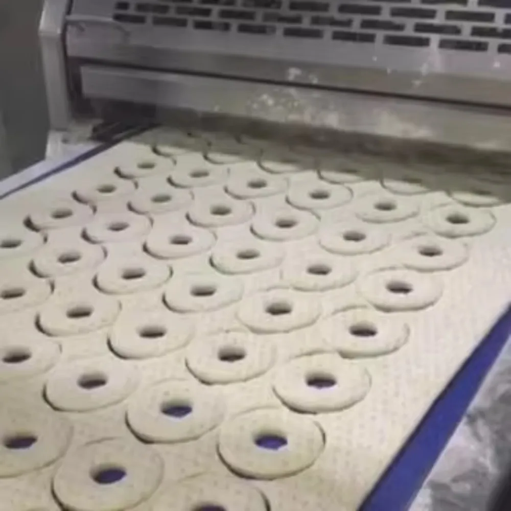 

Compact Donut Forming Machine – Mini Yeast Doughnut Cutter with Interchangeable Molds for Bakery