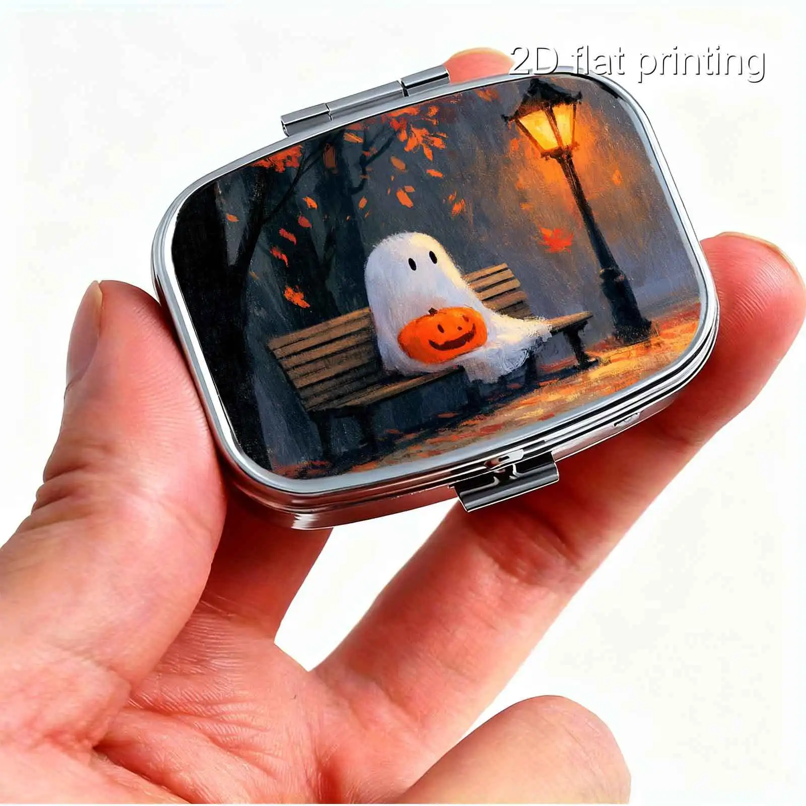 1Pc Flat Printing Pill Box, Portable Metal Material, Halloween Street Lamp Bench White Ghost Pumpkin Decorative Design, Autumn Warm-Toned Atmosphere Square Style Design, Pocket-Sized Pill Box, Mini Pill Box, Vitamin Compact Accessory Box, Compartmentalized Design, Easy Storage, Compartmentalized Storage, Ideal for Gift-Giving, Suitable for Business Trips, Portable and Easy to Carry