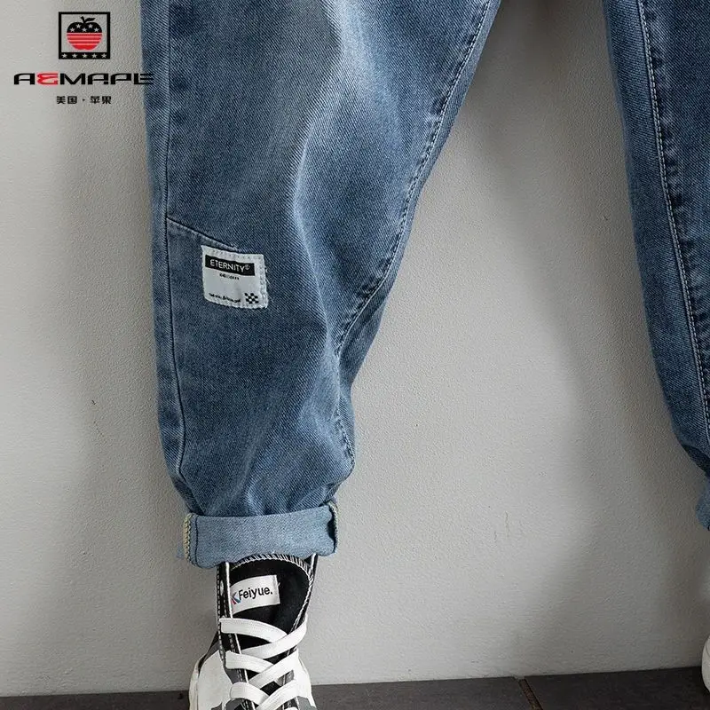 Ropa de calle de diseñador holgada para hombre, pantalones vaqueros bombachos sueltos con cordón, estilo Hip Hop, informal, primavera y otoño