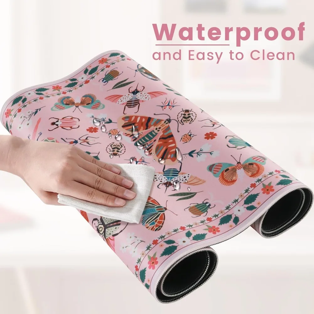 The pink mouse pad with rubber anti-slip and washable quality is a high-quality computer game accessory suitable for gamers