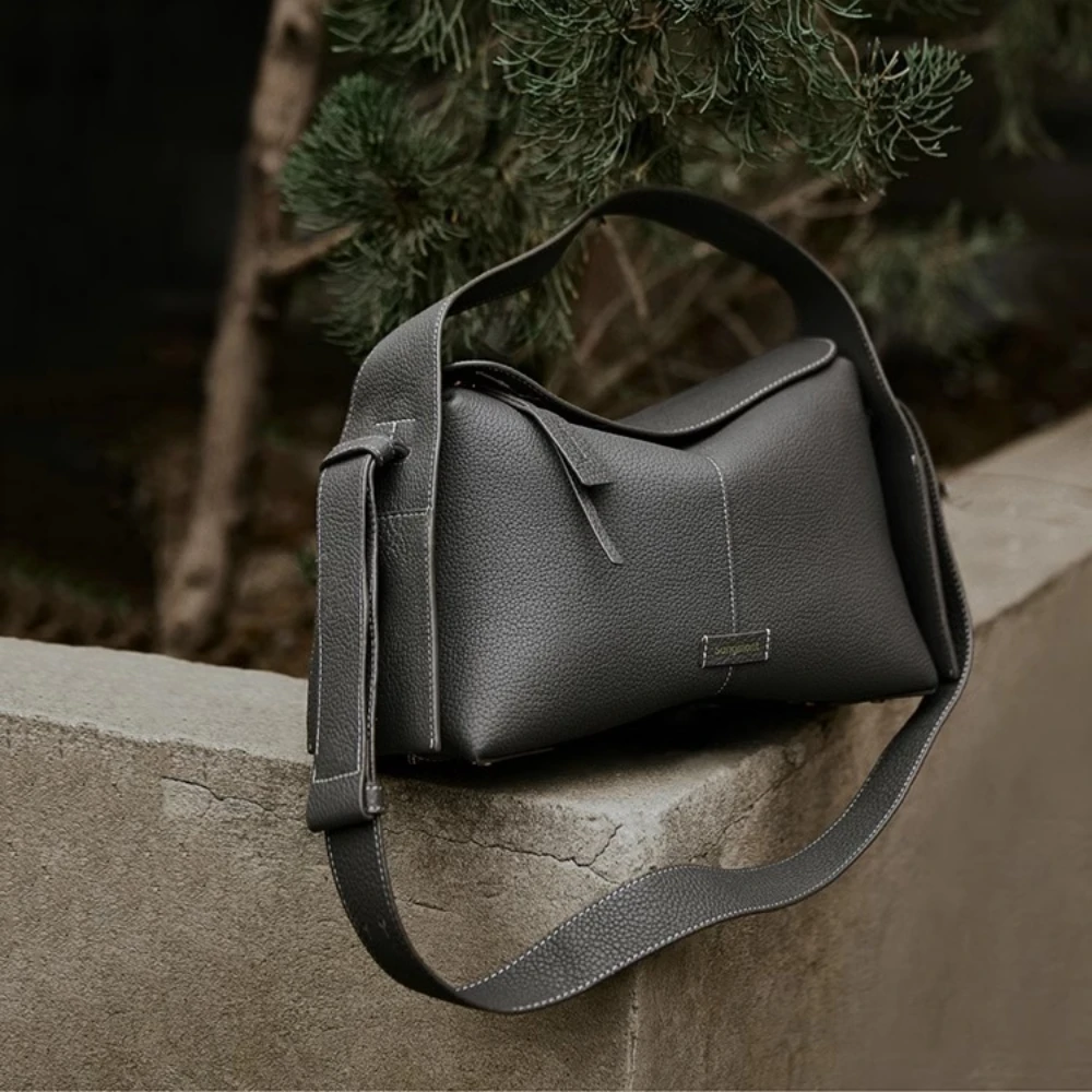 Songmont hanging ear series eaves bag designer new head layer cowhide commuter handheld crossbody hobo bag