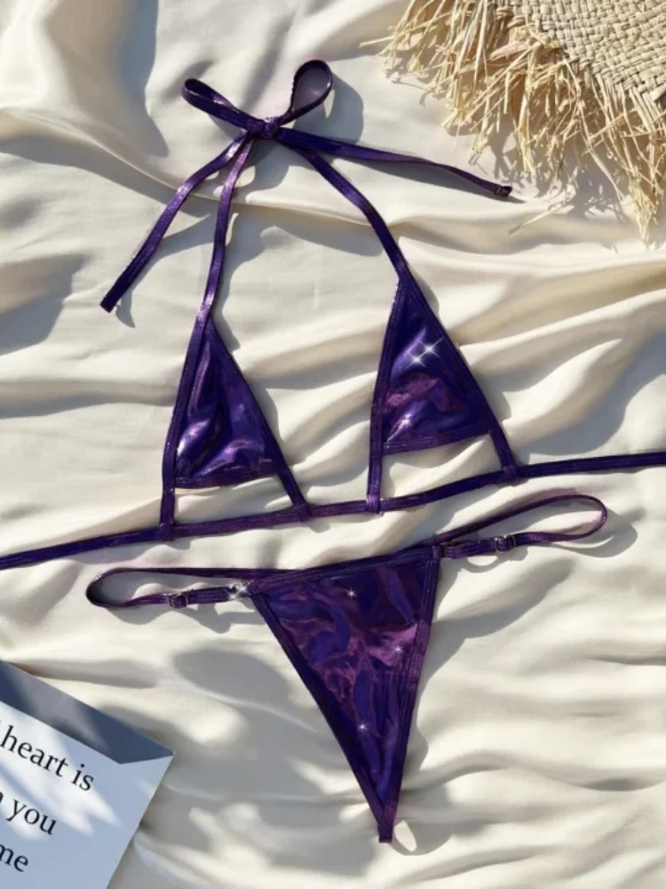 

beach hot spring vacation spicy girl sexy bikini European and American women's split metal pearl lace up sexy bikini swimsuit