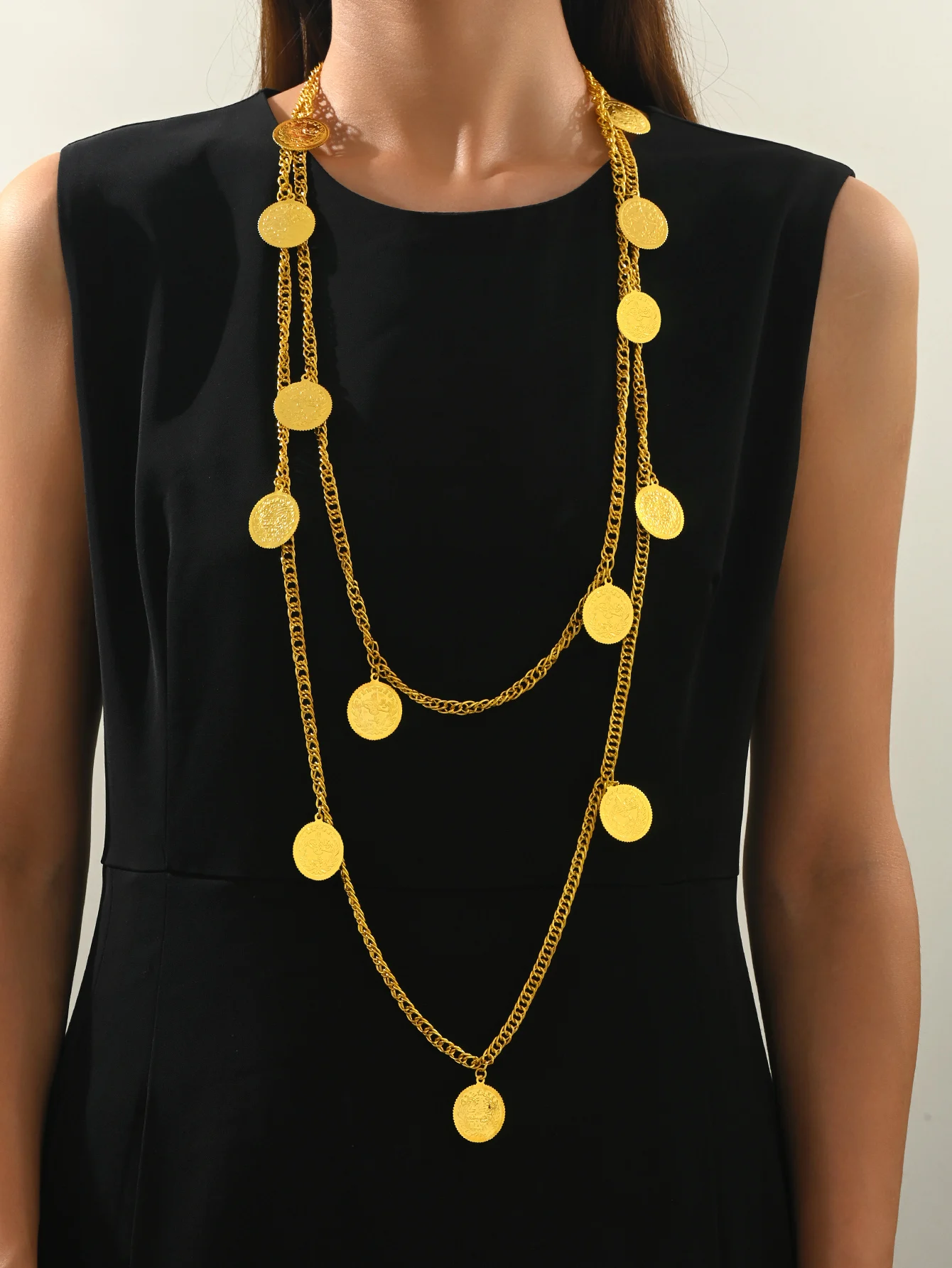 

Middle Eastern ethnic style characteristic necklace with multi-layer design, elaborate gold chain, stage accessory