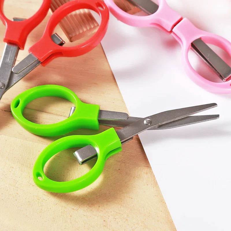 1PCS glasses scissors 8 plastic handle scissors travel portable folding scissors stainless steel scissors. Random color