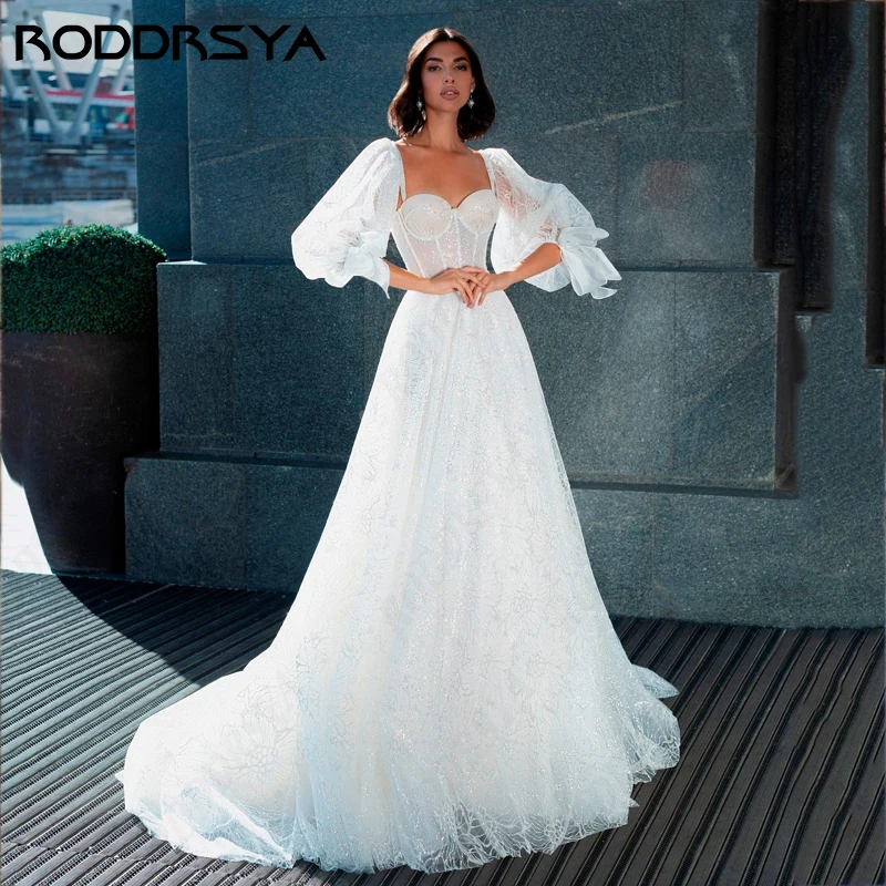 RODDRSYA Puff Mangas Querida Tule Vestido De Noiva Sparkly Glitter Branco Princesa Vestidos De Novia Sexy Brilhante Longo A-line Puff Mangas Querida Tule Vestido De Noiva Sparkly Glitter Branco Princesa Vestidos De Nov