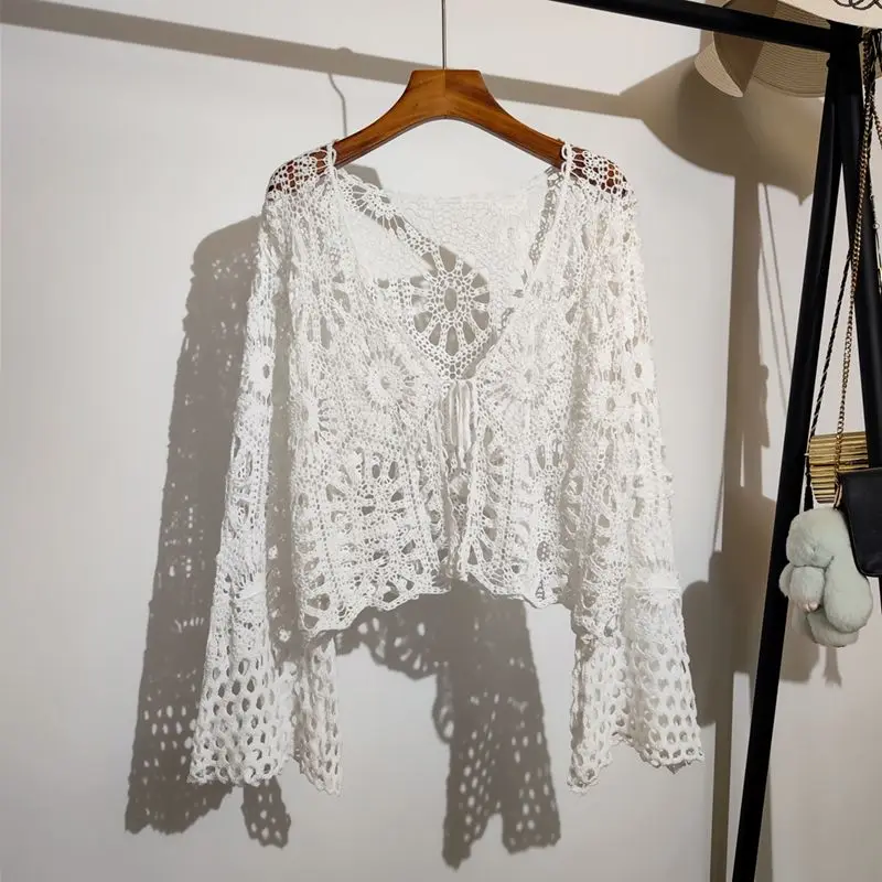 

Solid Color Sexy Long-sleeved Crochet Hollow Lace-up Knitted Cardigan Top Women's Summer New Bohemian Vacation Short Blouse