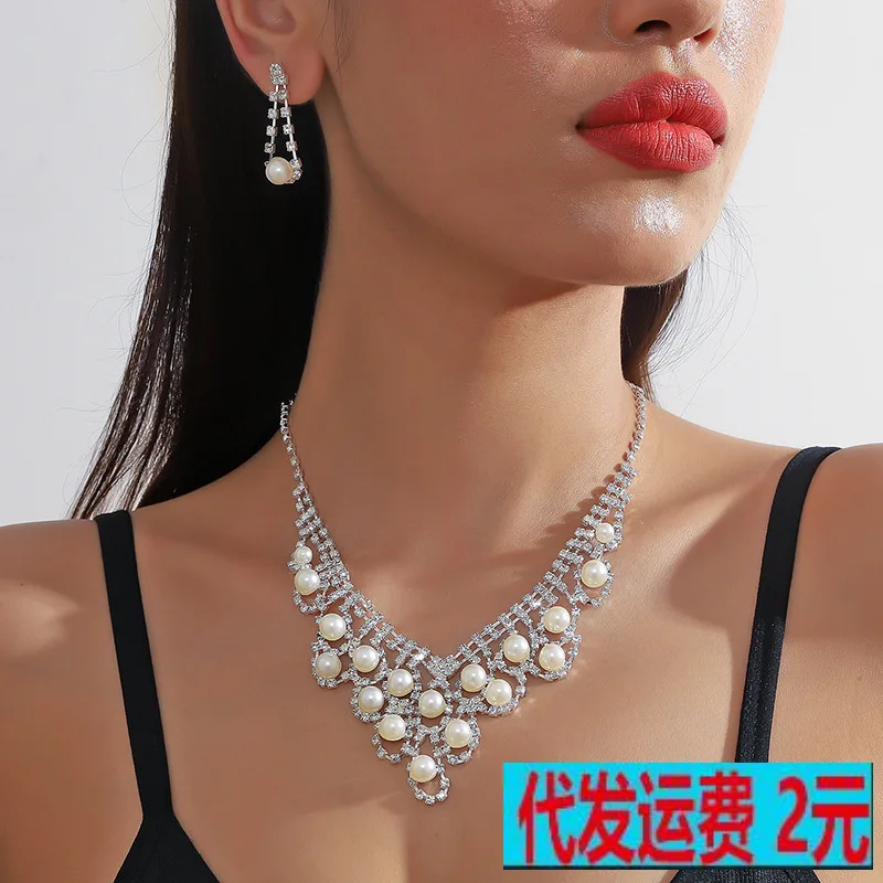 

Cross-border supply foreign trade claw chain series exaggerated pearl water crystal necklace earrings set dress banquet necklace
