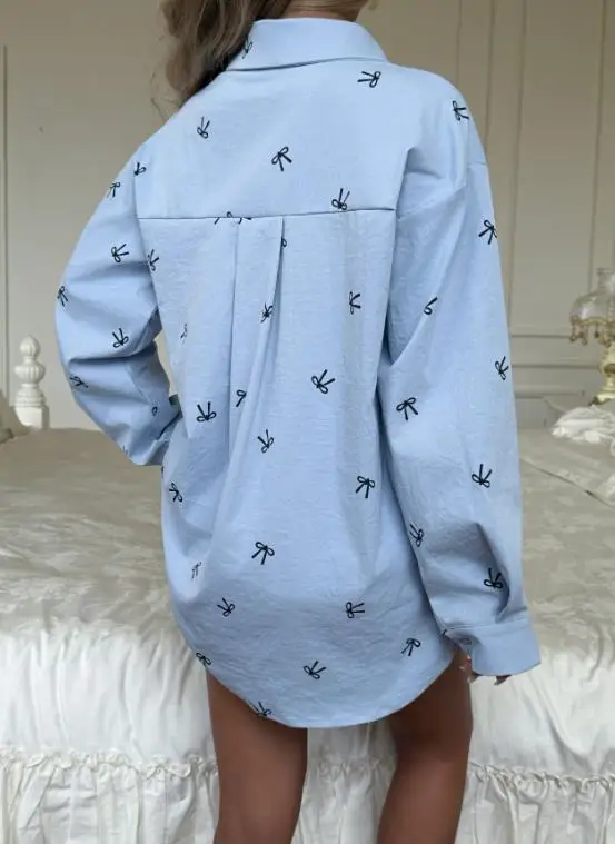 เสื้อผู้หญิง 2025 ฤดูใบไม้ผลิ ฤดูใบไม้ร่วง แฟชั่นใหม่ ลายโบว์ ปกพับ แขนยาว มีกระเป๋า ดีไซน์อเนกประสงค์ สไตล์ลำลอง ทรงหลวม