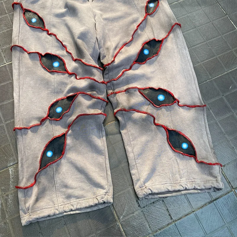 Set di maglioni con camicia con cappuccio calda e sciolta con stampa di occhi demone scuro parodia di strada di Halloween