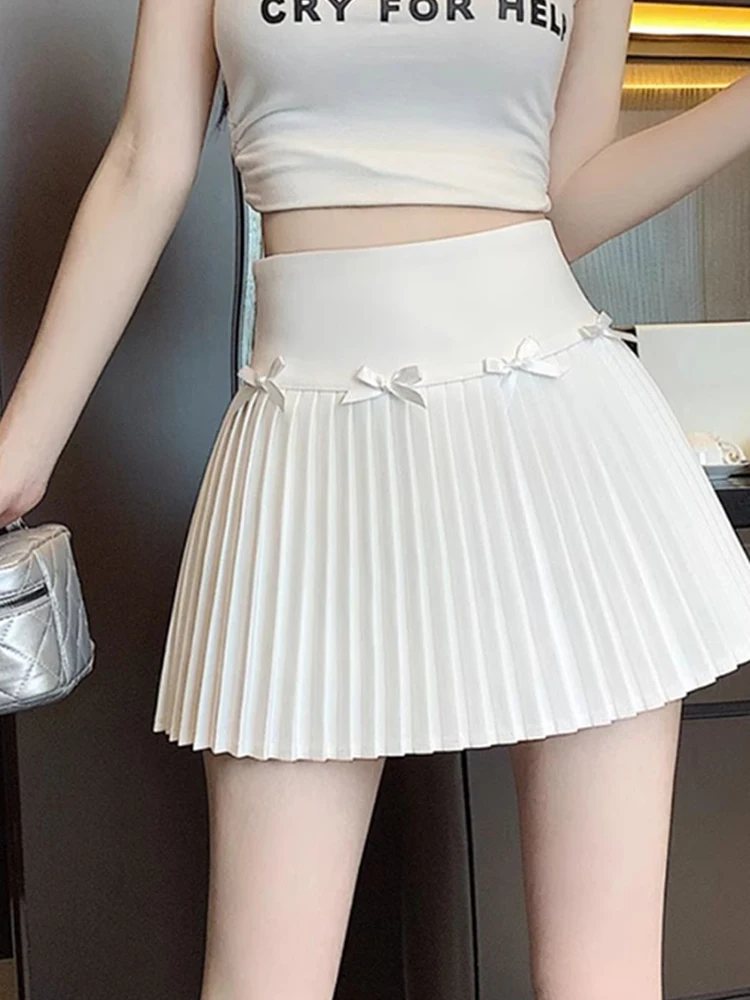 Mini saias femininas vintage arco cintura alta magro estilo preppy saia plissada menina moda streetwear doce culottes