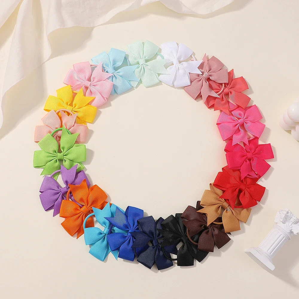 โบว์ติดผมเด็ก 20 ชิ้น/ชุด ขนาด 2 นิ้ว ยางยืดรัดผมมินิโบว์น่ารักสำหรับเด็กผู้หญิง ที่รัดผมหางม้า อุปกรณ์เสริมผมเด็ก