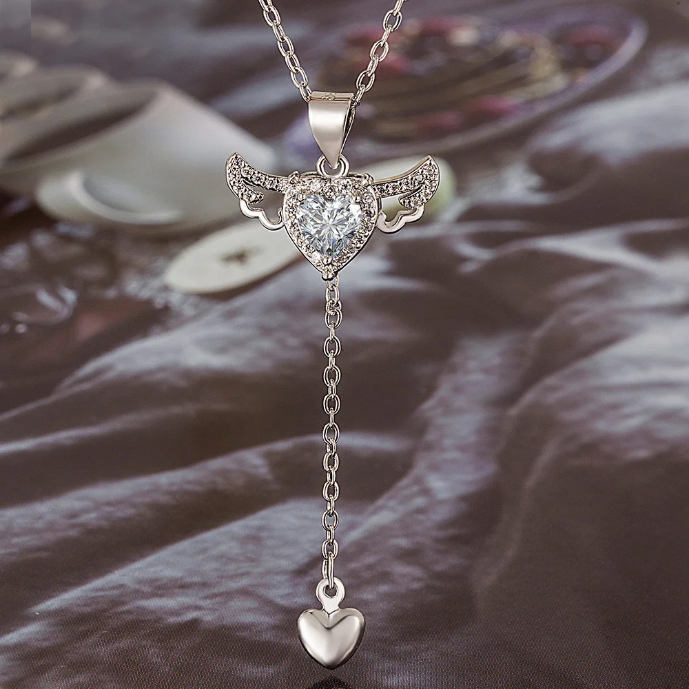 

Европейское и американское ожерелье в форме сердца Купидона, инкрустированное цирконом, легкое роскошное романтическое женское праздничное ожерелье с крыльями ангела