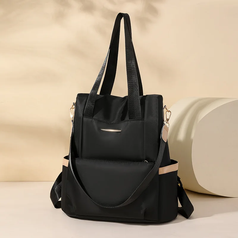 Europe and the United States new fashion casual backpack lightweight waterproof large-capacity anti-theft travel slung backpack.