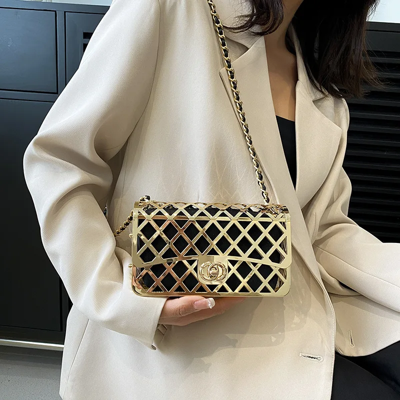 

﻿ The new style metal small square bag lady hollow personality evening messenger bag all-in-one chain bag