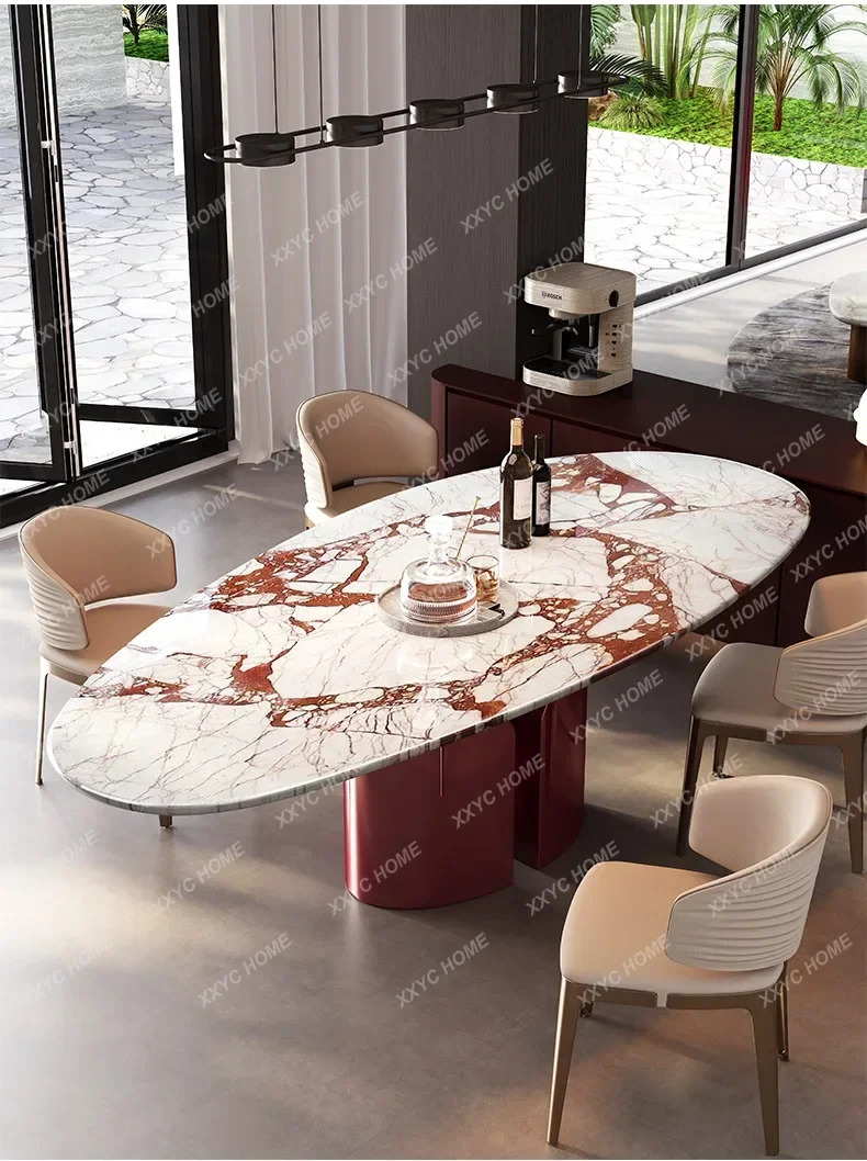 Imported natural marble dining table, water drop-shaped high-end oval light luxury high-end red luxury stone dining table