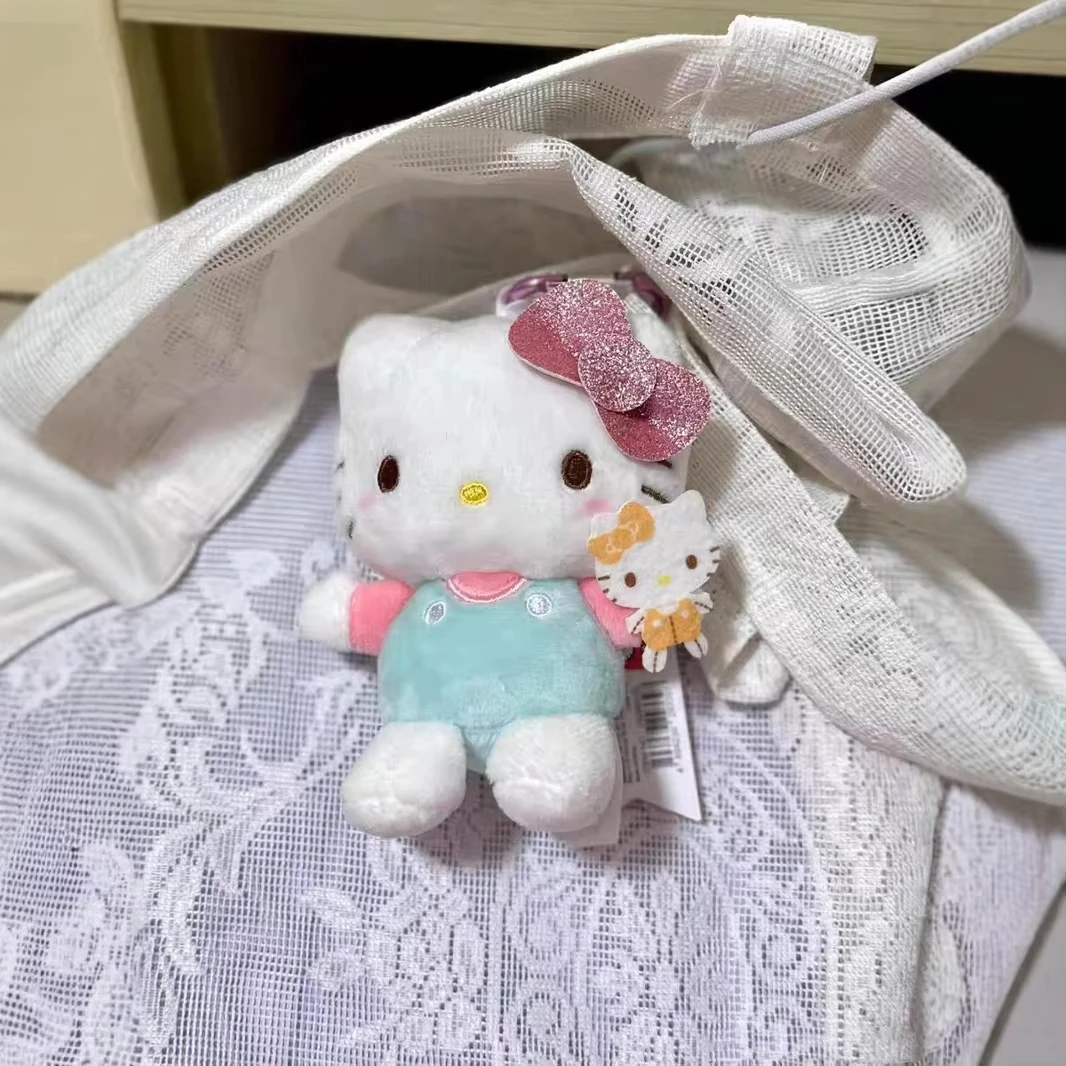 漫画ハローキティクマ抱きシリーズぬいぐるみかわいいフィギュア人形おもちゃ愛キーホルダーバッグアクセサリー女の子フェスティバルギフト