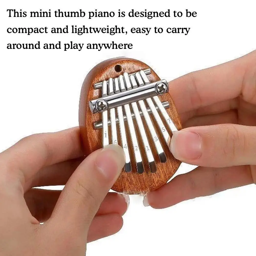 

Mini thumb piano 8 tone mini kalimba crystal transparent instrument beginner portable finger finger piano piano W7Z1