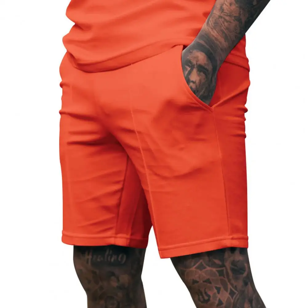 Celana Pendek Pria Regular Fit Celana Pendek Kaki Lebar Pinggang Elastis Menengah Pria dengan Saku Celana Panjang Kasual Warna Solid untuk Pakaian Sehari-hari