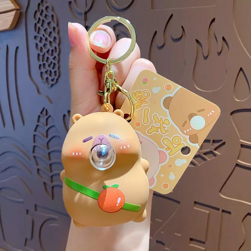 Cartoon scared me, blow bubbles, decompress keychain, schoolbag pendant, car key chain pendant.