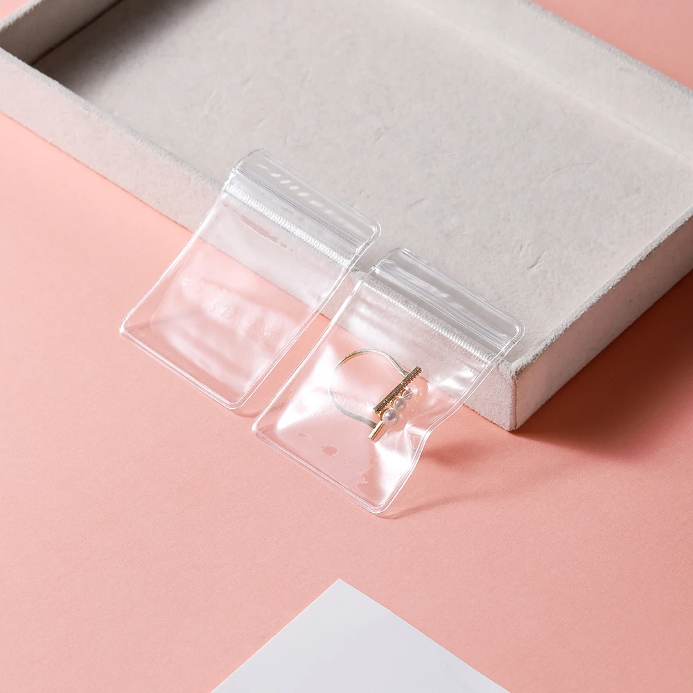 20-50 pezzi sacchetto di immagazzinaggio di gioielli in PVC trasparente per orecchini collana borse antiossidanti orecchini sacchetti di imballaggio organizzatore di gioielli