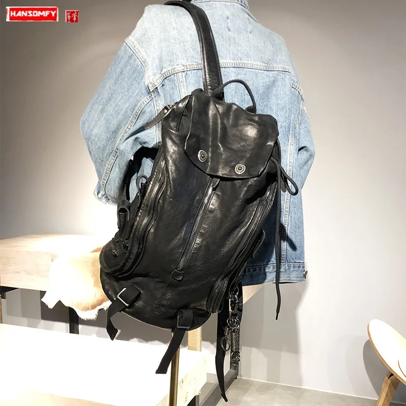 

Rewashing water to make old retro cowhide backpack men and women backpacks Black leather couple big bag tide