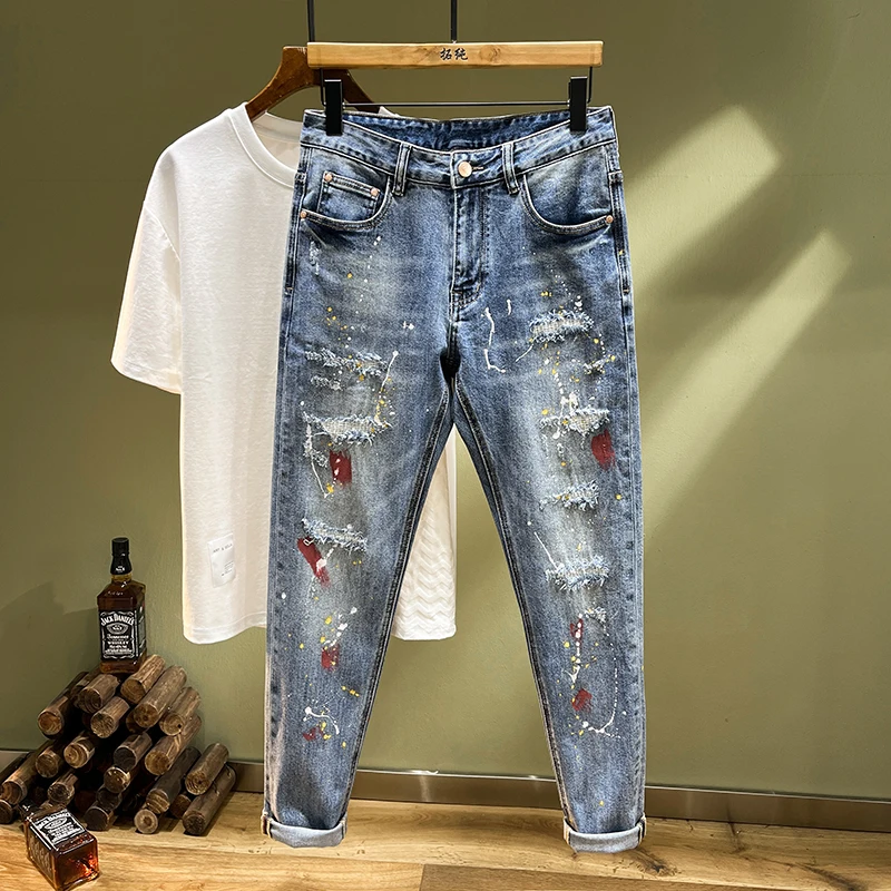 

Personalized street graffiti spray paint splicing men's jeans broken holes embroidery patches stretch Slim small leg pants