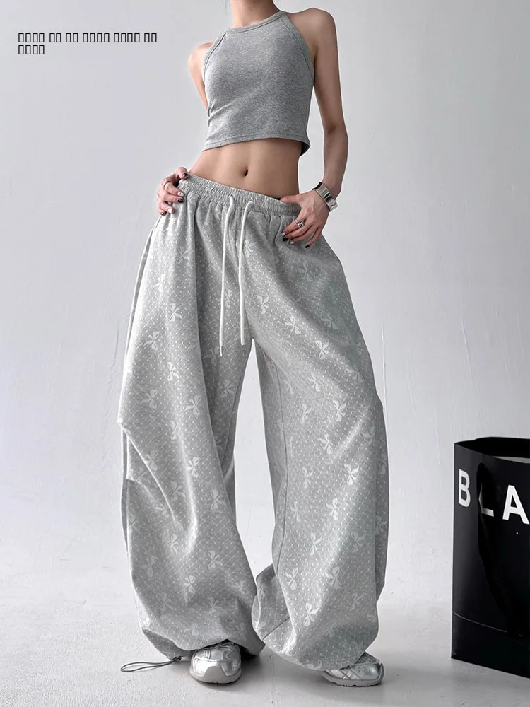 

Женские летние брюки с широкими штанинами, новинка 2025 года, свободные, повседневные, универсальные, для уличных танцев и спорта, с принтом, с завязками на высокой талии...