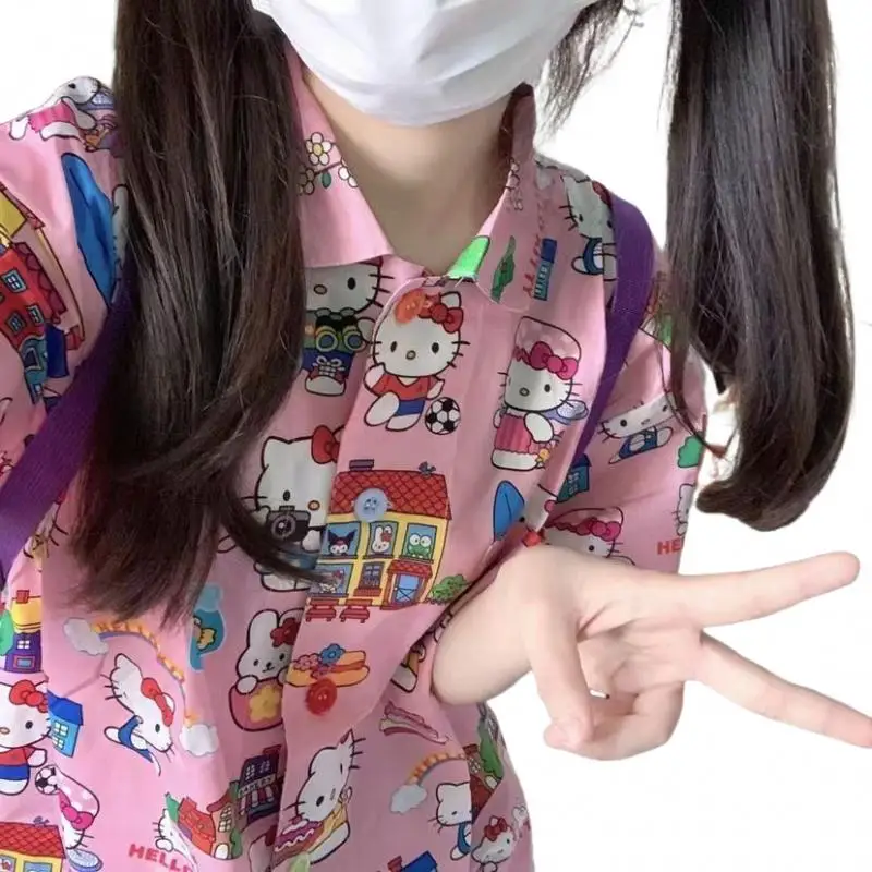 

Sanrio Hello Kitty Cute Printed Blouse 2025 New Summer Student Pink Short Sleeve Shirt Y2K Versatile Sister Retro Tops for Women