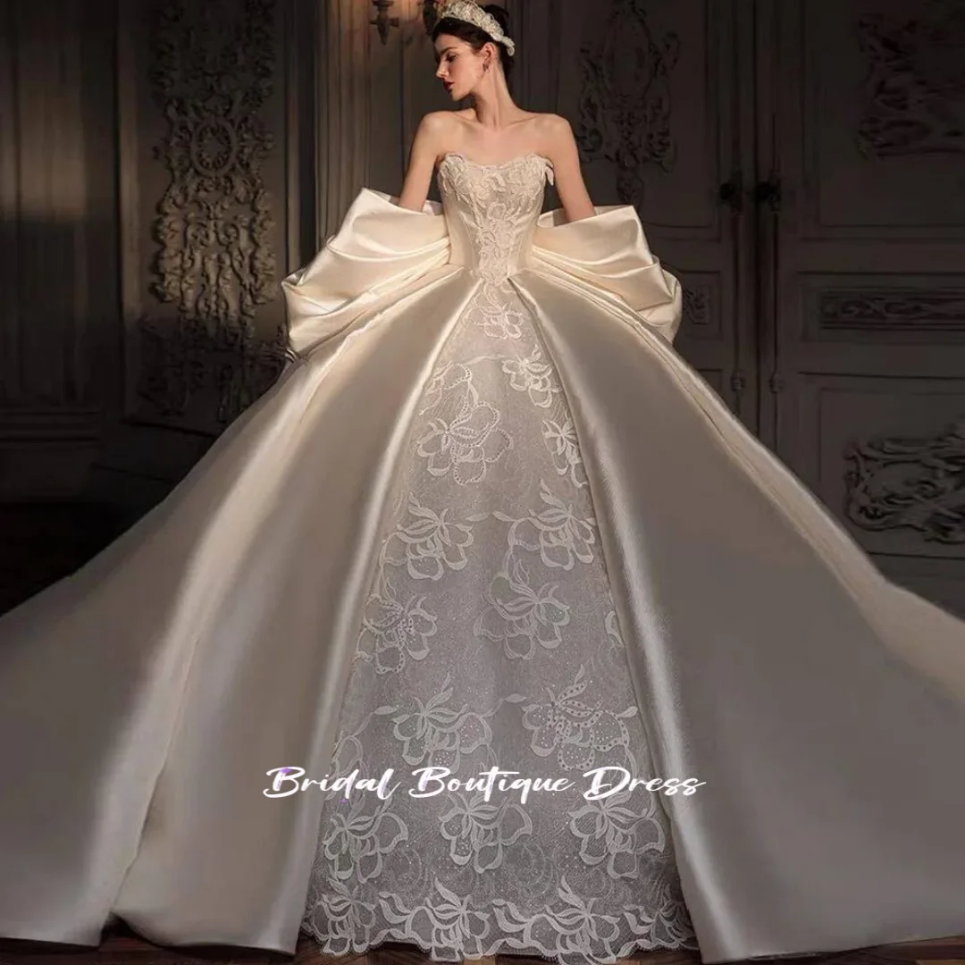 Customized Luxury  Sweetheart Neck Satin Wedding Dresses with Big Bow Exquisite  Beading Appliquess Bride Dress Vestidos De Novi