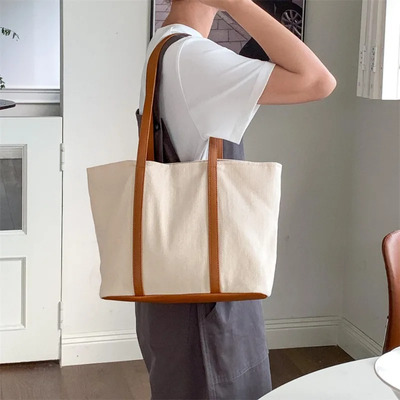 

Large-capacity Canvas Tote Bag for Women Urban Minimalist Style Travel Shoulder Bag Handbag for Work, Travel & Daily Use 2026