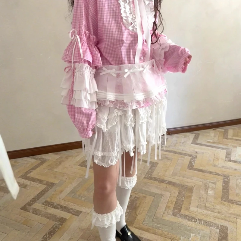 2025 الربيع الصيف الخريف الأبيض القوس لطيف المرأة مطوي تنورة قصيرة التصميم الأصلي الحلو شاش شفاف ضرطة الستار السيدات