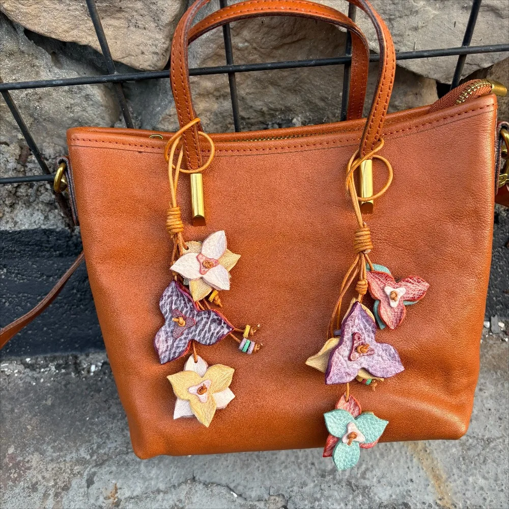

Genuine Leather Colorful Petal Flower Style Bag Charm Backpack Accessory with Multicolor Artificial Flower Decoration