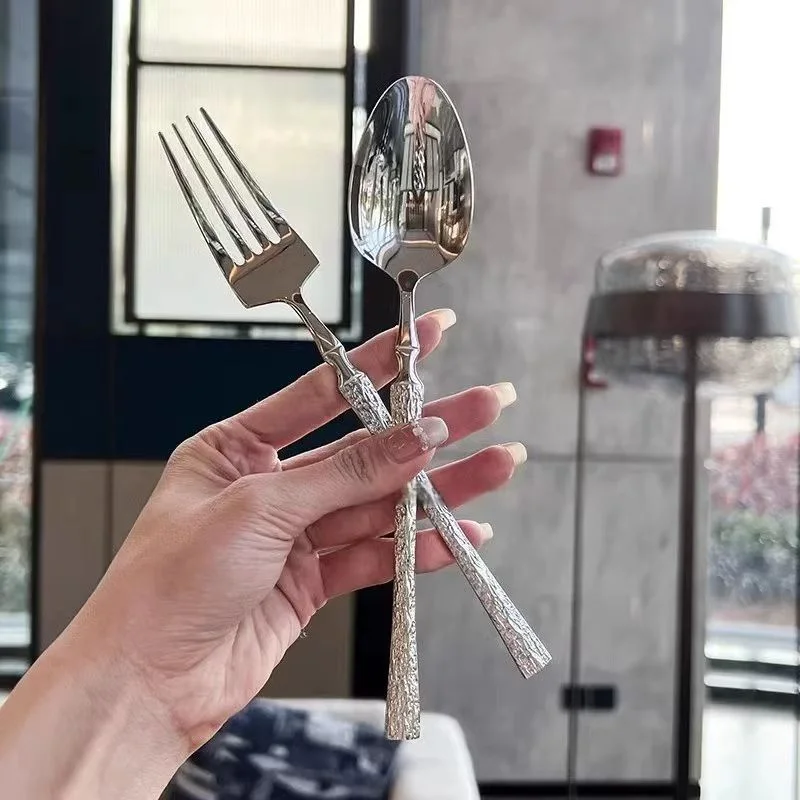 16-piece silver stainless steel cutlery set with forks and spoons, creative hammered handles - includes soup spoon and dinner fo