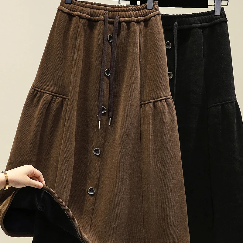 تنورة نسائية بلون سادة بتصميم بسيط للترفيه اليومي تنانير على شكل حرف a لشتاء 2025 تنورة عصرية عالية الخصر #4