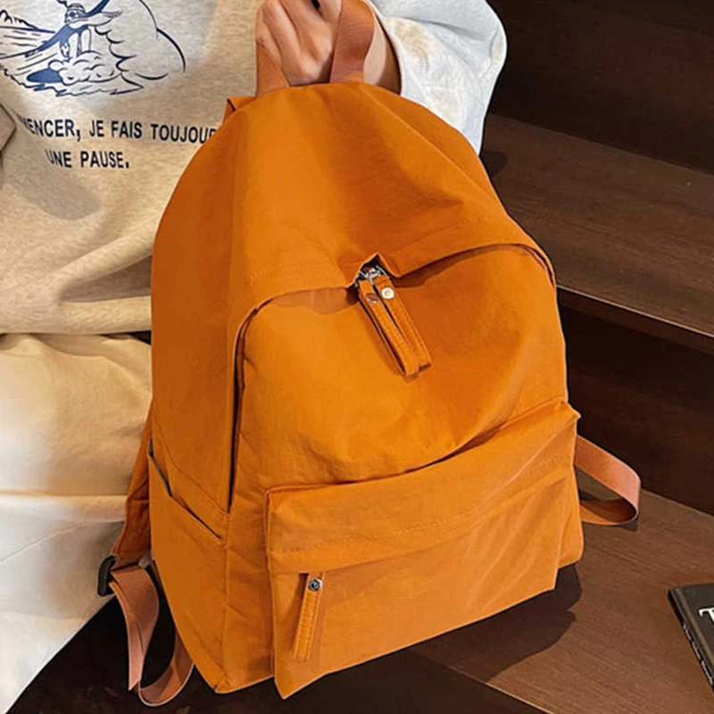 Borse da scuola per studenti semplici in stile coreano Zaino da viaggio di grande capacità per il tempo libero Borsa a tracolla per computer unisex in tinta unita