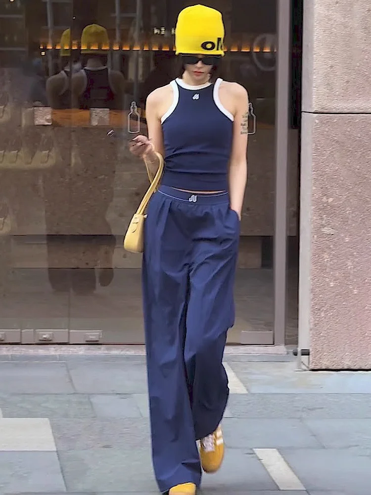 

Летний повседневный комплект из двух предметов: приталенный жилет и брюки с широкими штанинами для женщин